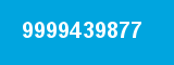 9999439877